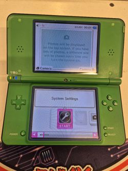 Nintendo DSi XL Handheld Game Console C/UTL-USZ Green + New Battery WJF10(contact info removed)