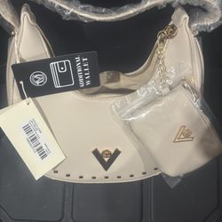 This is a Valentino Orlandi vegan leather  bag.
