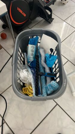 Laundry basket with windows cleaning utensils