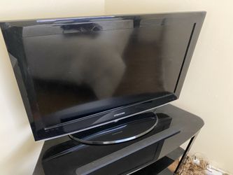 Console table + 36 in Samsung TV