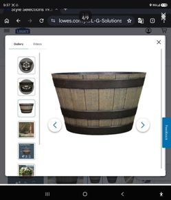 Whiskey barrel planters several available
