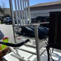 White wooden porch rocking chair