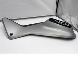 Brand New Husqvarna 401 Vitpilen Silver Satin Right Side Cover with Decal  Description:  Enhance your Husqvarna 401 Vitpilen with this brand new Silve