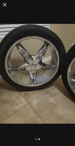 22" rims with tires.