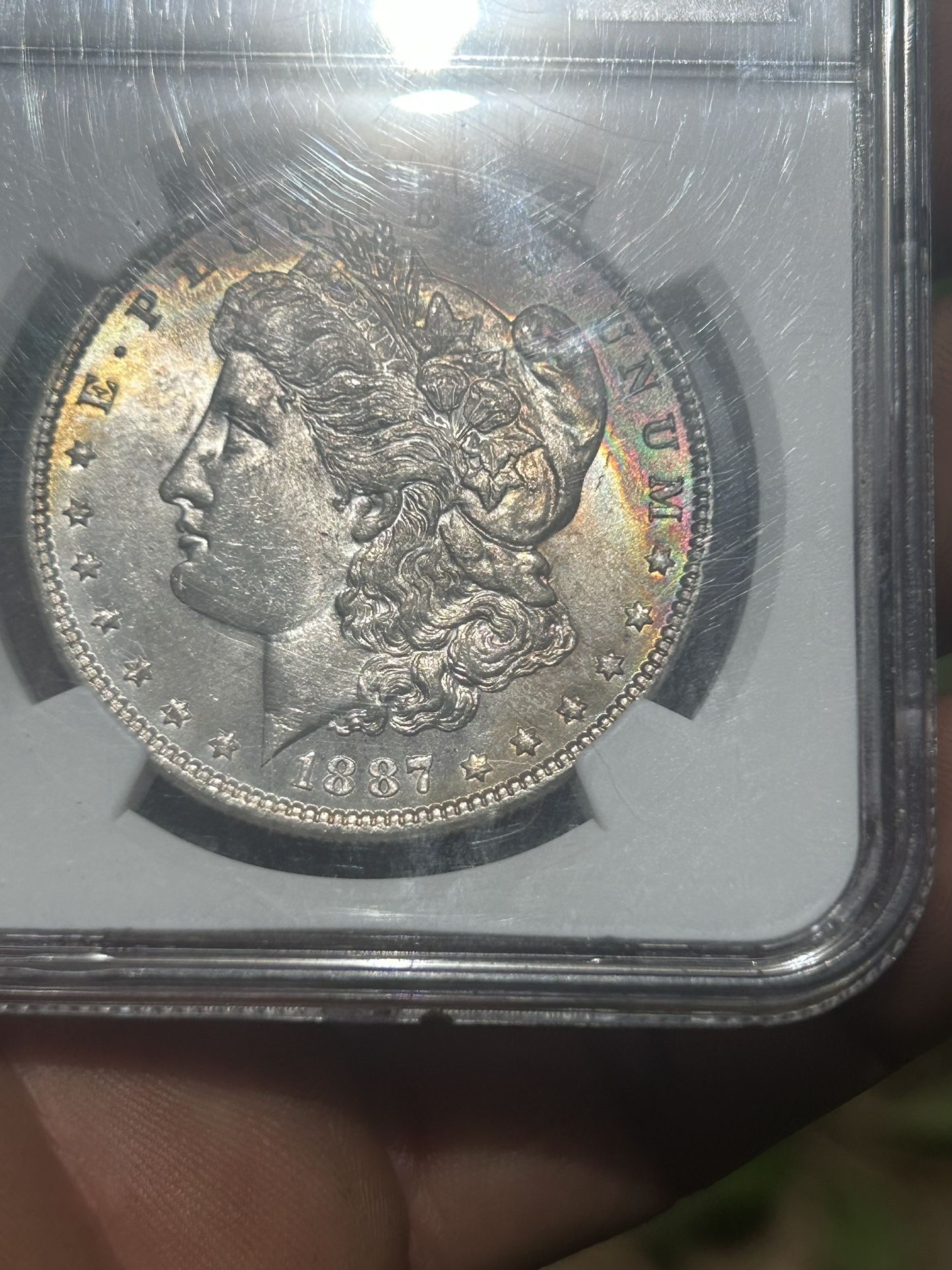 Morgan Silver 1887 – MS 64 silver Morgan Dollar with crescent tonnage