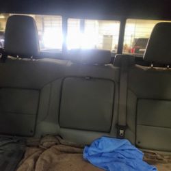 (contact info removed)3 .....16 To 19 GMC OR CHEVROLET 60/40 SPLIT REAR SEAT COVER WITH ARMREST....OIL,MUD AND WATER RESISTANT