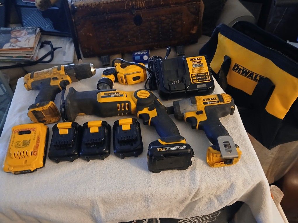Selling Combo Set Dewalt Tools 12 V Saw Saw Pivot Screw Impact Drill  Flash Lite  12 And 20v Charger  4 12v Batteries  1 20v  Battery  Plus Bag $ 300 
