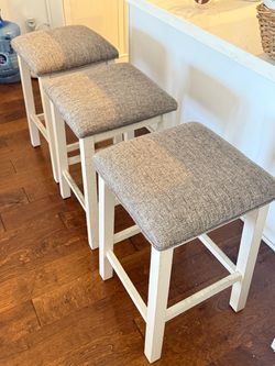 Set of 3 Counter Height Barstools – Gray Cushioned Seats, White Farmhouse Legs