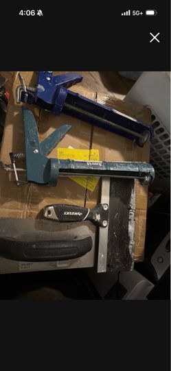 2 caulking guns 1 10 inch mud knife 1 grout troul asking 20 for all