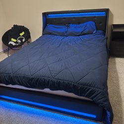 Bed with bedside tables and mattress