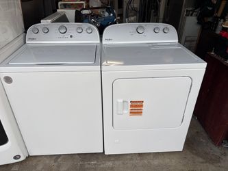 Whirlpool top load washer and gas dryer