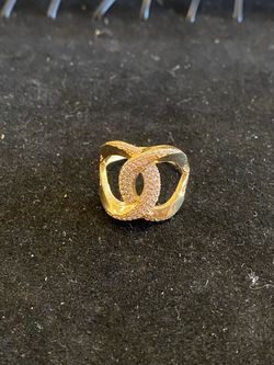CC gold ring with baguettes