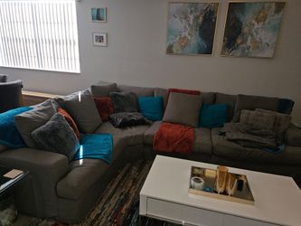 Beautiful Gray sectional with Ottoman