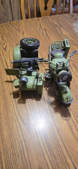 Vintage model  German military motorcycle with a sidecar