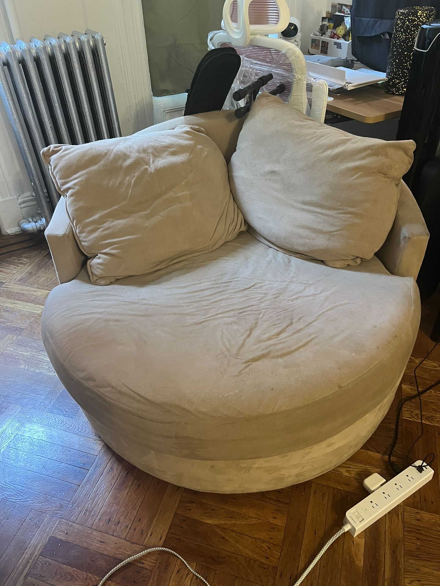 Beige Swivel Sofa