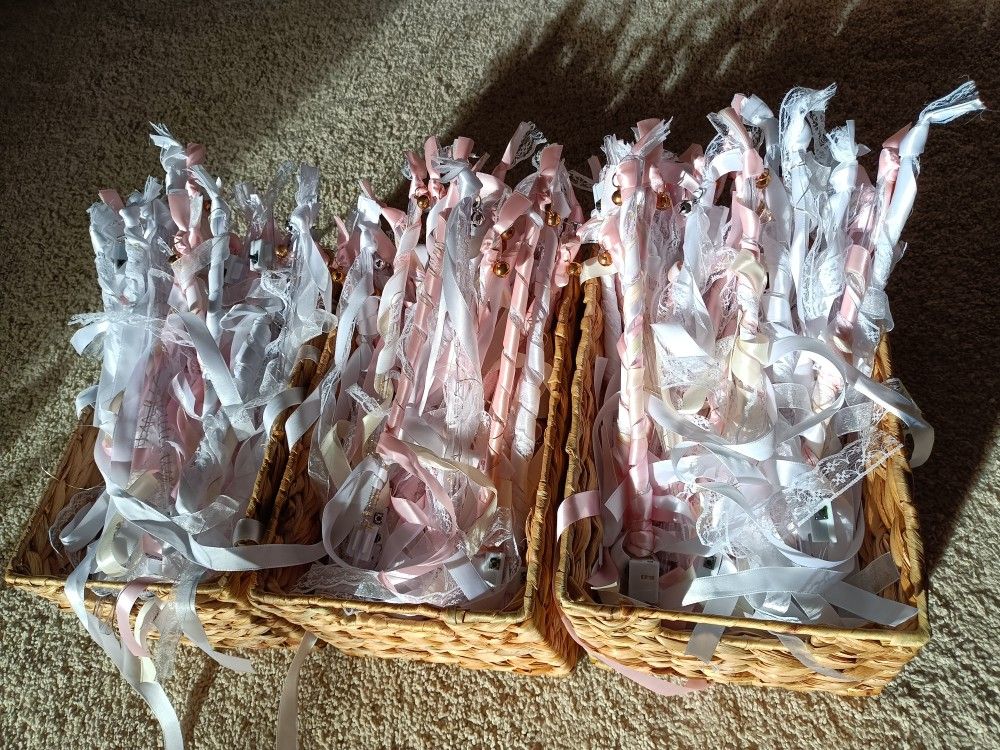 Light up Ribbon wands for party wedding holidays with fairy lights, jingle bells and ribbons attached
Baskets included for carrying wands
Condition i