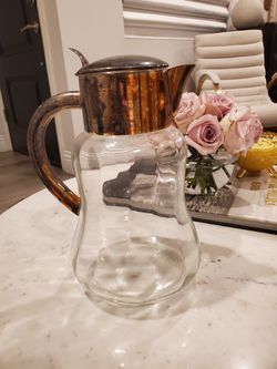 Glass and silver plated carafe
