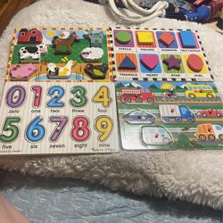 Four Wooden Board Puzzles 