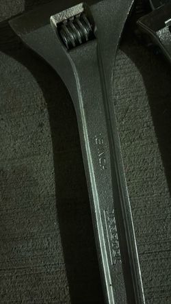 Wrenches and adjustable wrenches