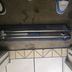 Yes, the term "Quinn" likely refers to the brand of the heavy-duty tile cutter 