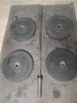Olympic Weight Set Includes  5ft Solid 35lb Bar  2x45lb Bumper Weights   2x25lb Bumper Weights Thats 180lbs All Together With The Bar