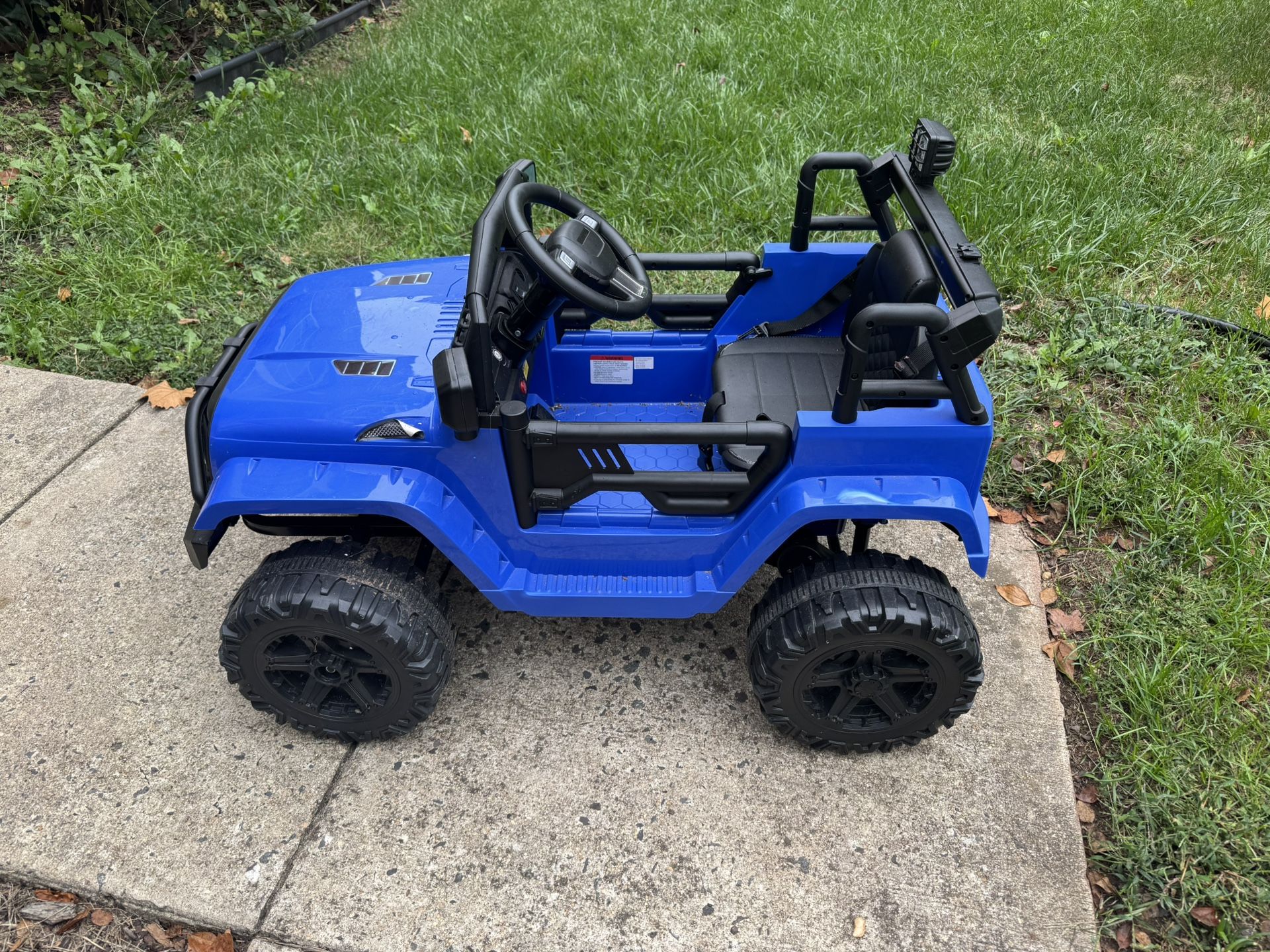 Blue Jeep Battery-Powered Ride-On Toy Car