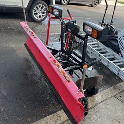 WESTERN 6 FOOT PLOW WITH LIGHTS AND HOOKUP TO TRUCK