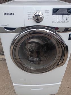 Samsung Washing Machine With Pedalstal Included Works Well Delivery Is Available 

Features multiple wash cycles including Eco Wash and Steam Cycles.