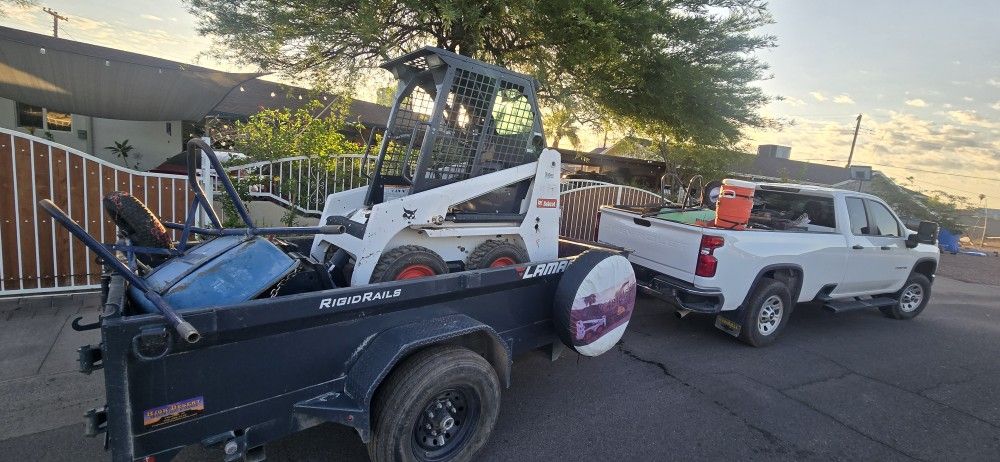 Dump Trailer And Bobcat