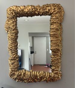 Gold wall mirror
