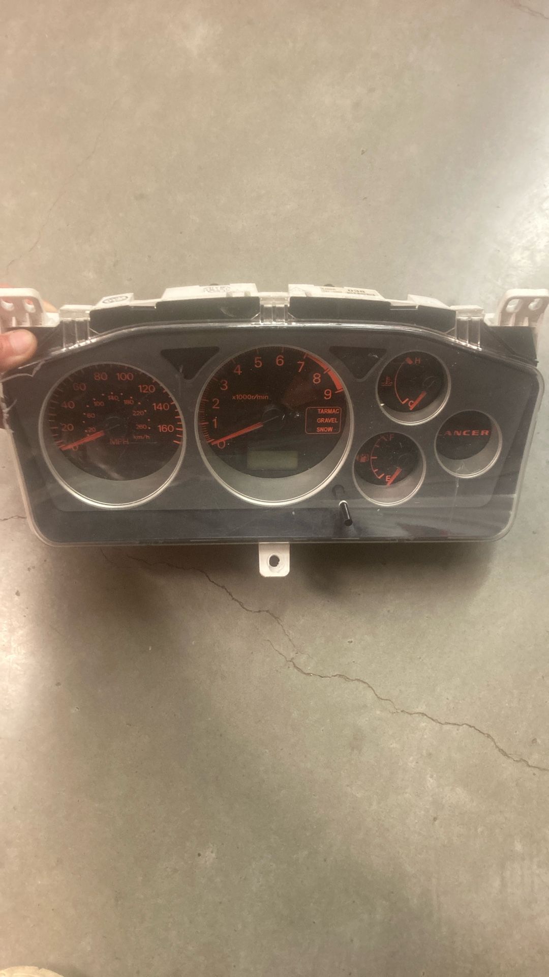 Mitsubishi Lancer Evolution 7, 8, or 9 instrument gauge cluster.