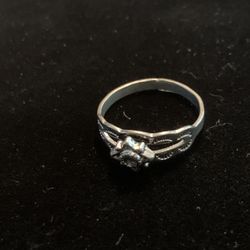 Silver Colored Ring With Black Center 