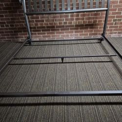 BEAUTIFUL METAL BED FRAME VERY EASY TO ASSEMBLE/ HARDWARE TO PUT THE HEADBOARD ON/  (ITS FOR A FULL SIZE BED) IT HAS WHEELS & STUFF CAN FIT INDER THE 