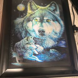 3D lenticular framed art piece featuring wolves
