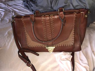 Brown and gold purse