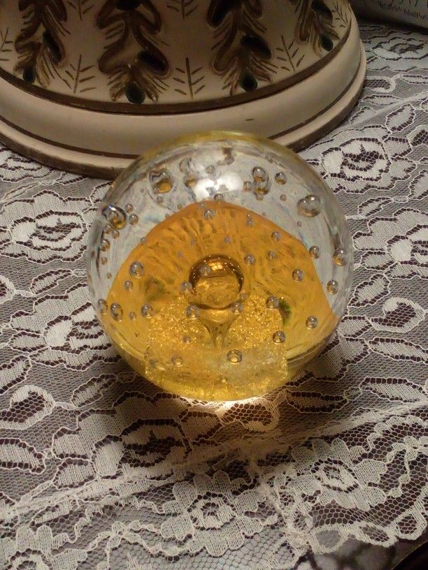 Clear Glass Ball Paperweight With Yellow Inside