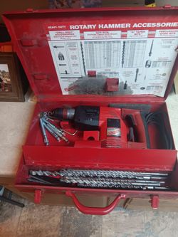 Milwaukee electric corded rotor Hammer with 11 bits made in Germany in case works great