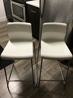 Like new white acrylic bar stools  (2)