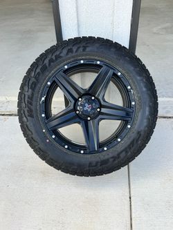 One 5 lug Falken Wild Peak all terrain A/T tire w rim came off 2019 ram 1500 classic/ great spare