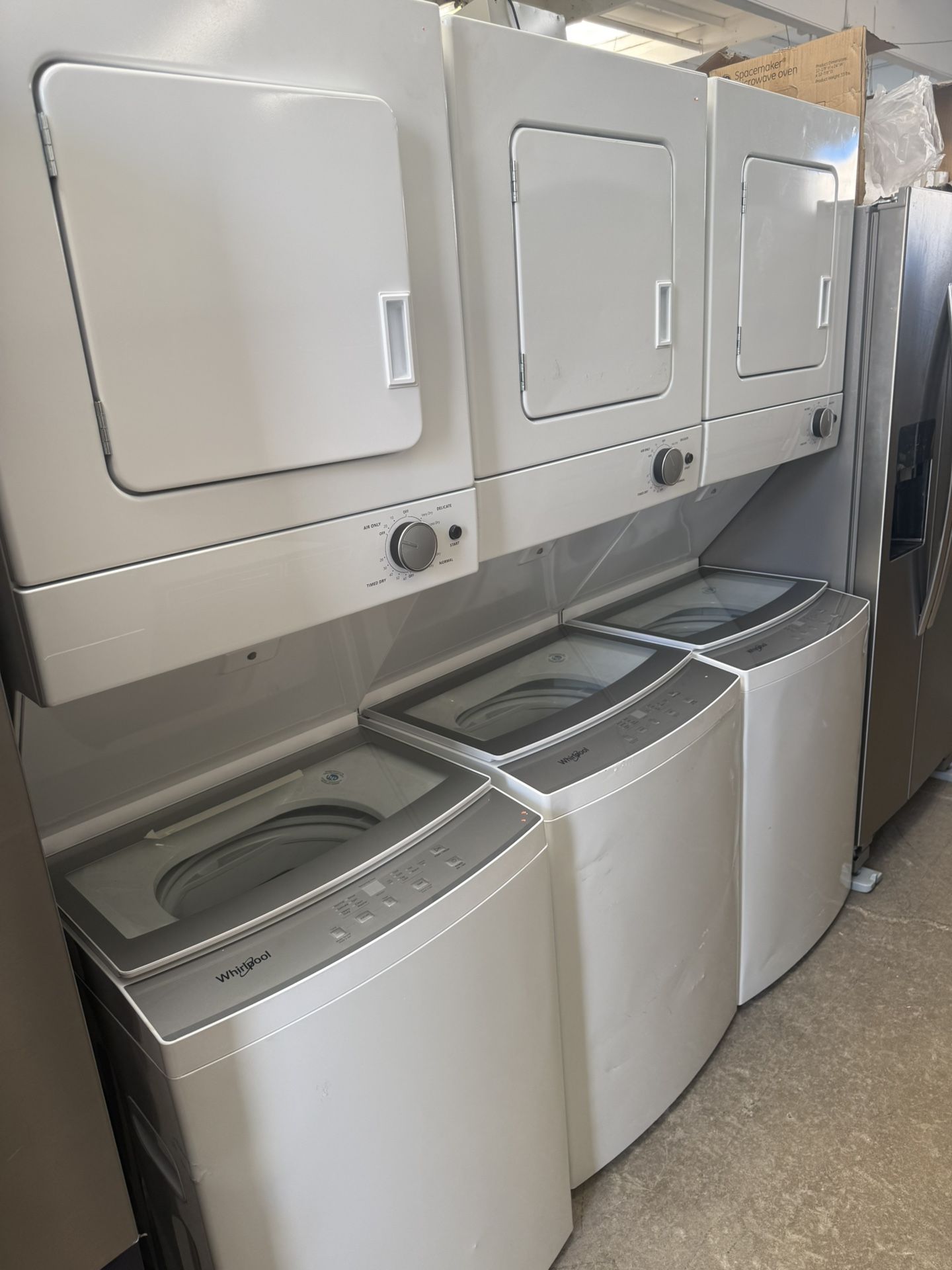 Whirlpool Stacked Laundry Center Top load Washer and Electric Dryer