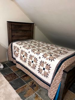 Twin bed with Serta Mattress with box spring from Ashley furniture