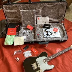 Fender Telecaster and Fender Blues Amplifier.