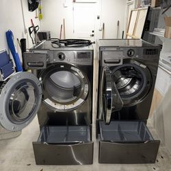 Large LG washer and dryer with storage pedestals