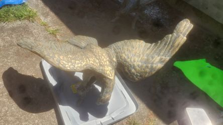 eagle 15 pounds  Brass from win g to wing  32 inches     left wing 22 inches   right wing 13  inches