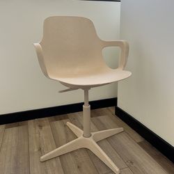Swivel beige chair from Ikea