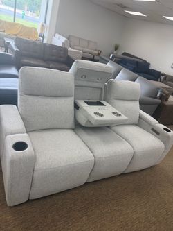 Greymel- fabric sofa with two power recliners and USB ports