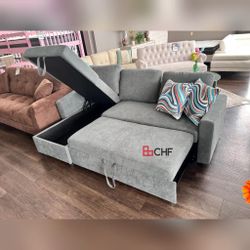 Sectional sofa with storage chaise and pull out bed 