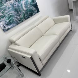 Atlas White Leather/Vinyl Power Reclining Sofa Loveseat Excellent Condition. Adjustable Headrest / Footrest. Dimensions: 83W x 33H x 43.5L. Was $2,400
