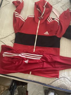 Red Adidas sweat suit