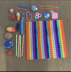 20+ Fidgets  and a MEGA POP-IT